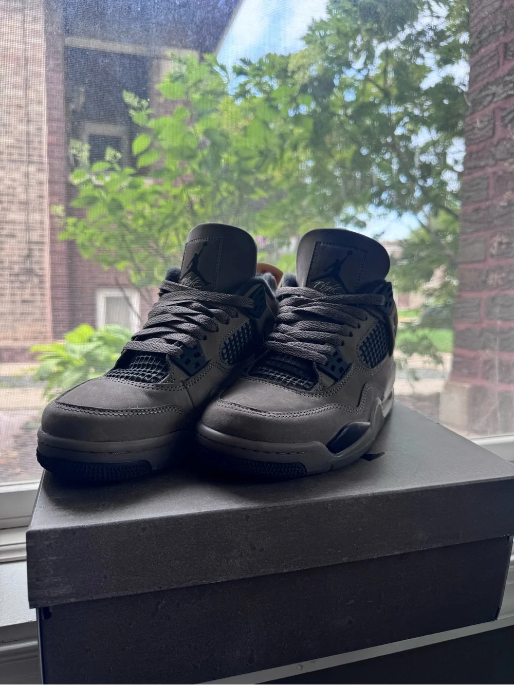 Air Jordan 4 Retro Sneakers in Dark Grey
